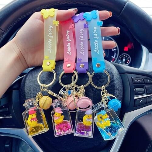 1Pc Creative Milk Bottle Yellow Duck Key Chain Liquid Floating Quicksand Bottle Keyring Backpack Pendant Keyfob for Women Men