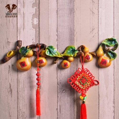 A wall hanging hook hoist Chinese creative coat rack row hook bedroom wall hook clothinroom