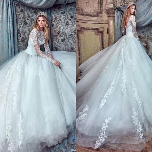 Spring Couture Wedding Dresses High Neck Long Sleeves Ball Gowns Open Back Bridal Gown with Lace Applique Flowers