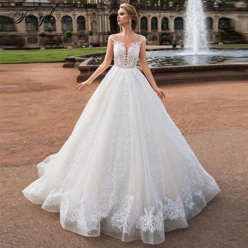 Traugel Chic Sexy Backles A Line Lace Wedding Dresses Elegant Scoop Neck Applique Cap Sleeve Court Train Bridal Gown Plus Size