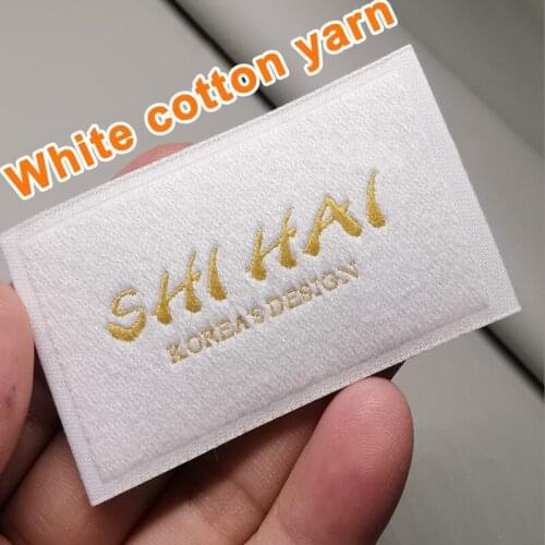 Customized FashionNameWovenLabelsGarmentLabelsPersonalizeCustomClothingWhiteCottonYarnLabelTagsFreeSampleDoesNotContainPolyester