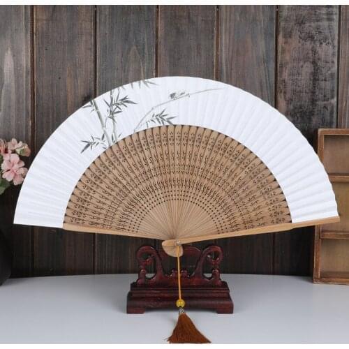New Chinese elegant solid wood printed rice paper fan is simple, elegant and unpretentious paper hand fan folding hand fans