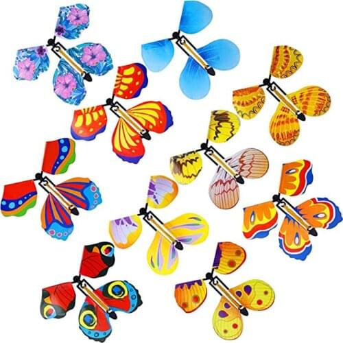 Flying in the Book Fairy Rubber Band Powered magic tricks props Wind Up Surprise Birthday Wedding Card Gift Cool stuff Butterfly