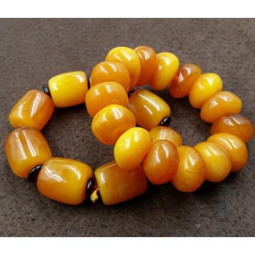 Factory wholesale boutique high-end Mens Large chicken oil yellow amber beeswax hand string bead bracelet a tube wall dies
