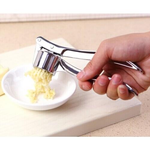 Pressure the garlic home crowd garlic peeling garlic shoot dao garlic machine kitchen utensils creative gadgets