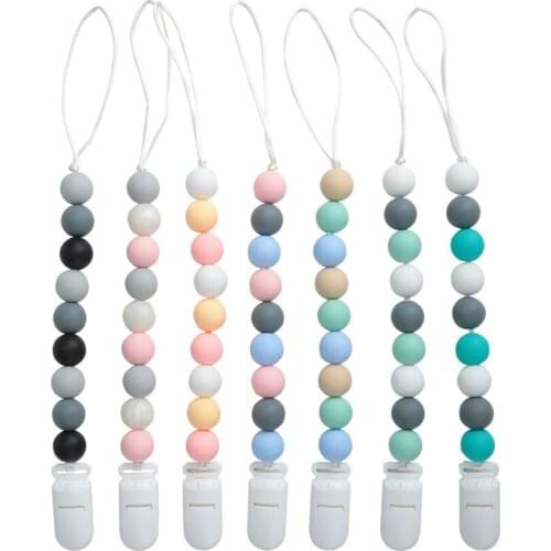 Appease baby silicone nipples with food grade gum to prevent chain loss