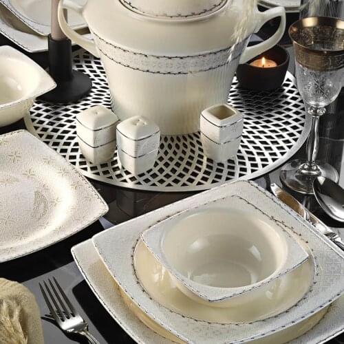 Kutahya has Porcelain Bone Mare 62 Piece 1136420 Pattern Dinner set
