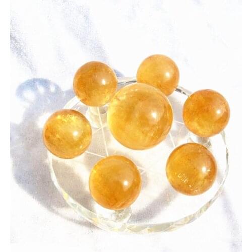 Feng Shui seven star array natural yellow calcite crystal ball + plate base decoration