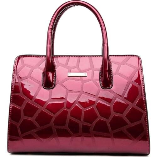 2020 new womens retro leather lamination casual handbag high-quality luxury one-shoulder stiletto bag designer bag