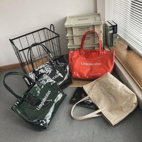 Letter Print Handbag Solid Color Clothing Packaging Bag Designer Shoulder Bag Unisex PVC Laser Shopping Tote Bags