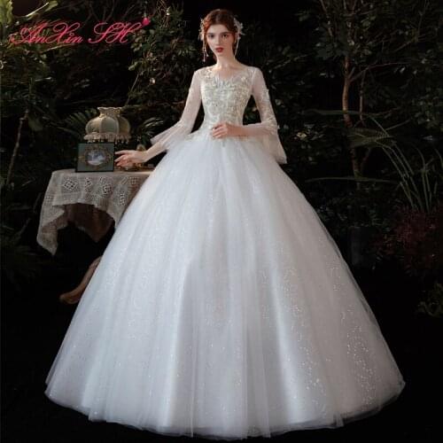 AnXin SH princess champagne flower white lace wedding dress vintage v neck beading illusion flare sleeve bride wedding dress
