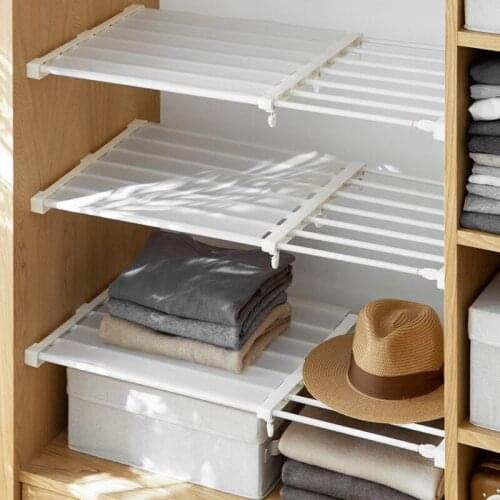 Hot salestTelescopic layered storage rack wardrobe cabinet bathroom nail-free adhesive partition shelf 65599