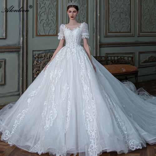 Alonlivn Gorgeous Scoop Neckline Ball Gown Wedding Dress With Short Puffy Sleeve Royal Train Bride Gown
