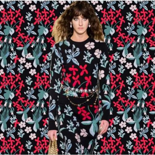 Polyester T-shirt fabric French brand designer series of new Floral pattern on black are used for sewing skirts and pants