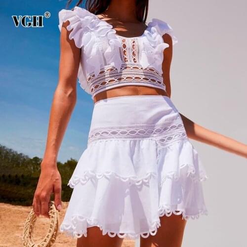 VGH White Casual Two Piece Set For Women O Neck Sleeveless Lace Up Top High Waist Mini Skirt Hollow Out Sets Female 2021 Fashion