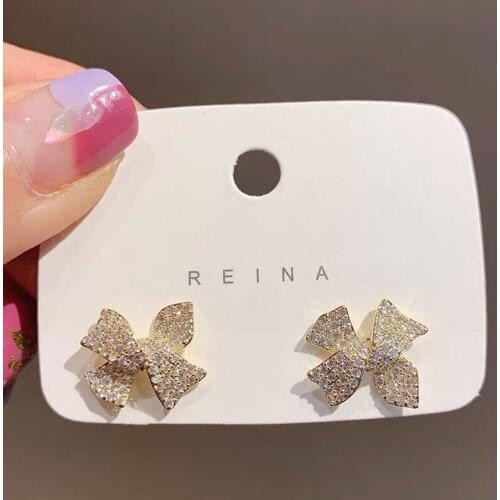 Korean fashion jewelry new design sense cute bow stud earrings high sense of temperament girl gift statement earrings for women