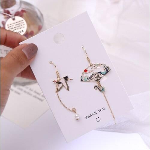 Fashion national wind eardrop individual asymmetric stud earrings elegant hollow out female earrings