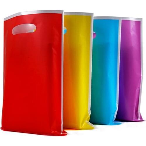 50/100pcs Solid Color Wedding Party Loot Bag 6 Color Plastic Gift Bag Black Red Blue Yellow Birthday Cookie Candy Bag for Kids