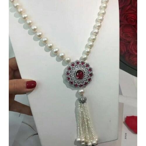 New design 9-10 mm `round white pearl Pendant necklace 28"