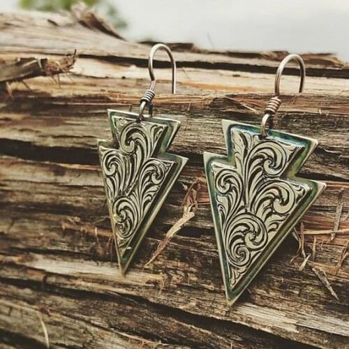 Rongyu European and American popular creative relief flower shield Earrings antique bronze hand carved Earrings Jewelry