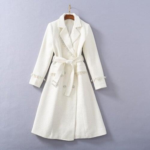 Korean style small fragrant wind 2021 winter new bright silk woolen rhinocerone double breasted pearl chain slim long coat