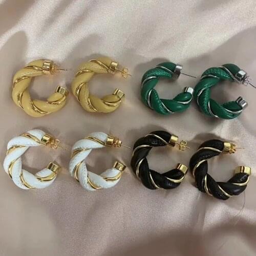 High-grade leather twist C earrings European and American new personality stars with retro heavy earrings women