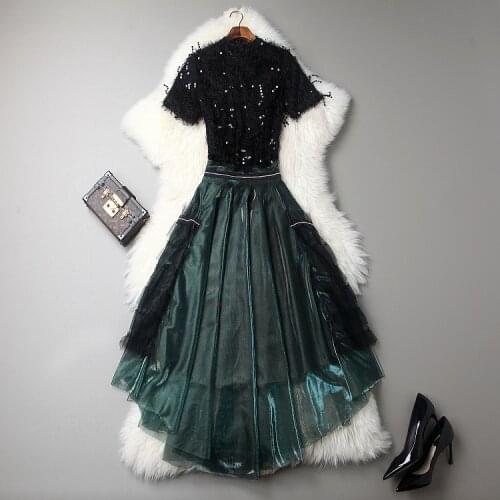 European and American womens wear autumn 2018 The new sequins With short sleeves tassel T-shirt + pleated skirts suit