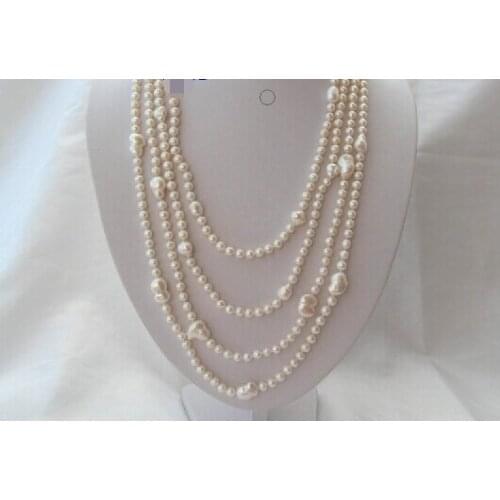 Beautiful long 100" white round baroque freshwater cultured pearls necklace