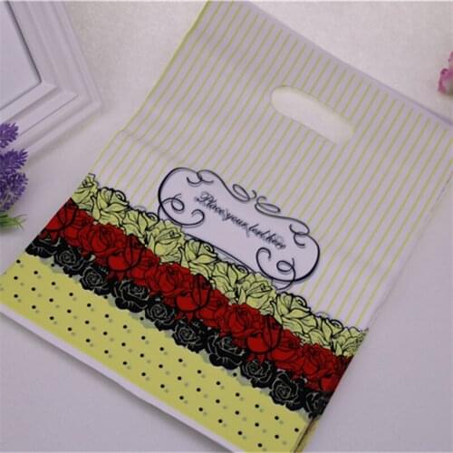 2021 New Design Wholesale 100pcs/lot 25*35cm Large Plastic Shopping Bags With Handle Birthday Gift Packaging