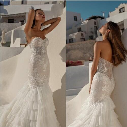 2020 Mermaid Wedding Dresses Sweetheart Sleeveless Lace Appliques Tiered Bridal Gowns Open Back Sweep Train Wedding Dress