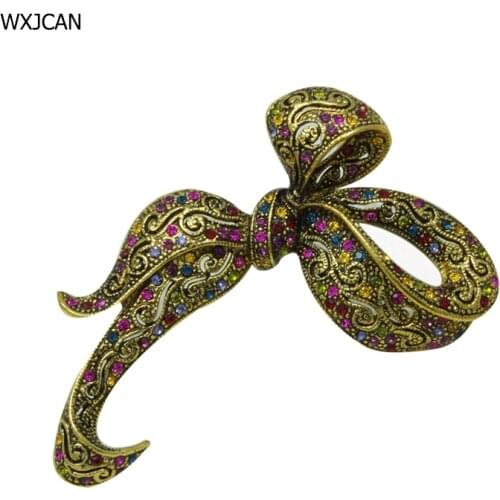 WXJCAN bowknot brooch vintage brooches Metal sculpted hollow pattern inlay rhinestone brooch Large brooches Size 70mm*45mm