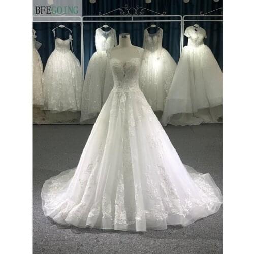 Ivory Lace Tulle V-Neck Sleeveless Floor-Length Princess A-Line Wedding Dresses Chapel Train Custom Made Bridal Gowns