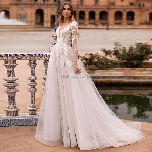 V Neck Long Sleeves Wedding Dresses Charming Lace Appliques Open Back Sweep Train Formal Bride Gowns Robe de Marrie Tulle Skirt