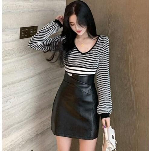 2021 HOT Spring Autumn Women skirt Sense of design Split Lrregular Leather skirt High waist Show thin Buttocks All-match Fashion