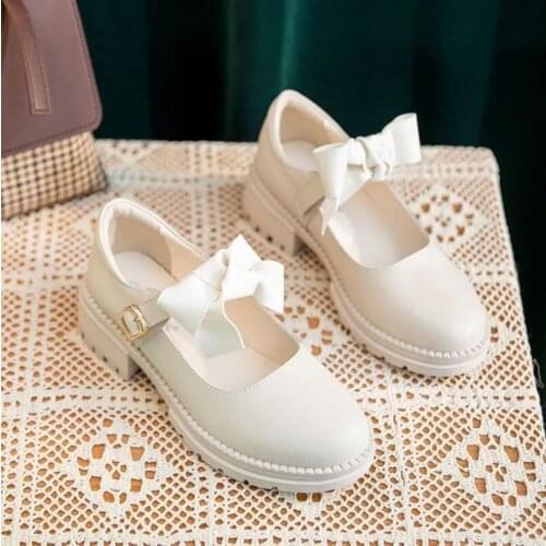 Xinningmeng Leather Pumps