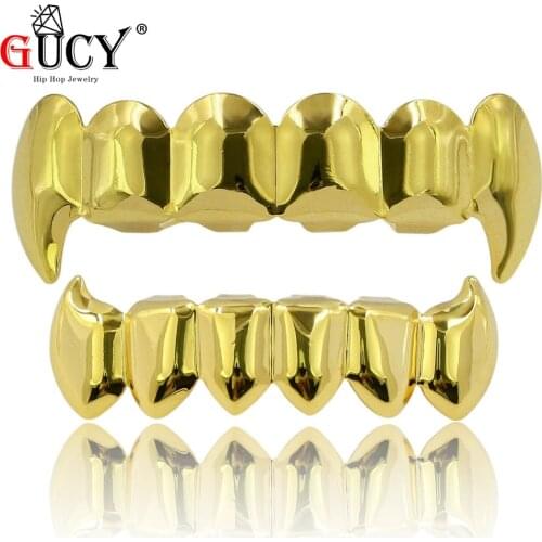 GUCY Gold Silver Plated HIP HOP Teeth Grillz Caps Top & Bottom Teeth Grills Set With Silicone Real Shiny Vampire Fangs Grill