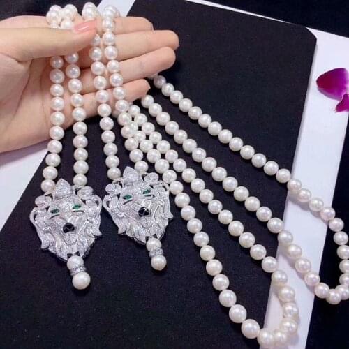 Animal green eyes lion bowknot four-leaf clover zircon pearl necklace simple high jewelry for women pearl necklace