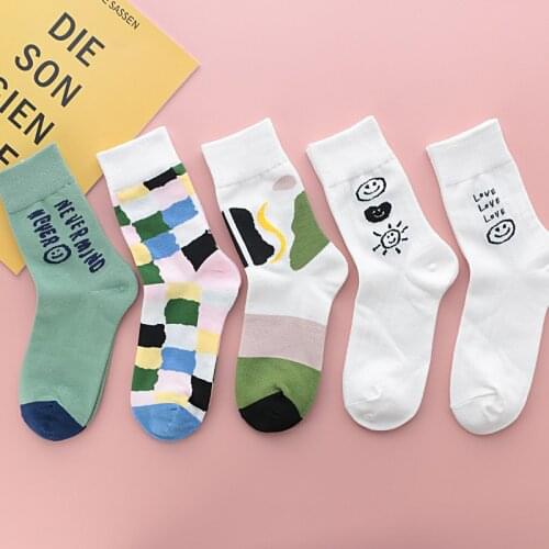 2021 autumn and winter new products Korean fashion all-match smiley face ladies mid-tube socks Japanese breathable sweat-absorbe