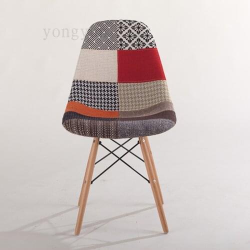 Minimalist Modern dinning chair Casual Plastic Dining Cloth art eat chair wood leg cloth Creative furniture without armrest 4PCS