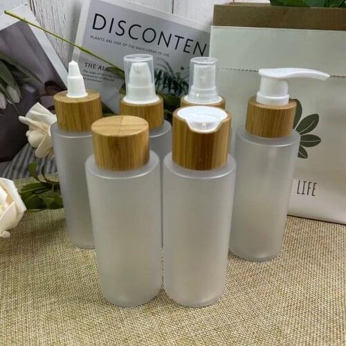 Cosmetic package set 250ml cream jar 60ml 120ml 250ml 500ml amber frosted clear plastic bottle with spray lotion pump bamboo lid