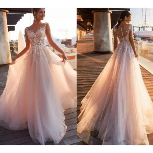 A Line Wedding Dresses 2020 Cap Short Sleeves Sheer Neck Illusion Button Back Lace Appliques Bridal Gowns Beach Wedding dress