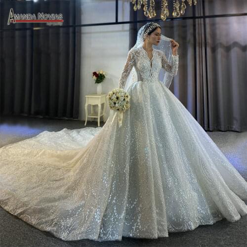 Long sleeves lace wedding dress with royal long train 2021 real sample work