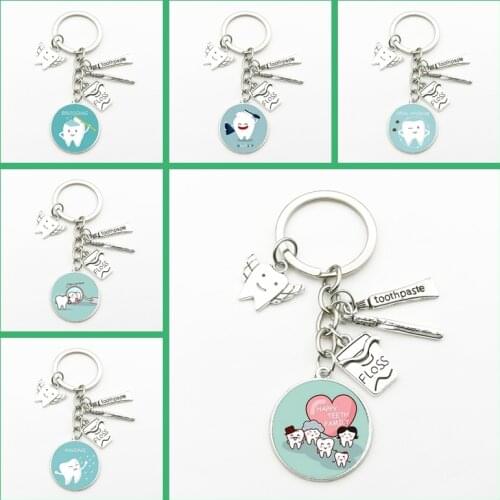 New Creative Dental Tooth Pendant Key Chain Cute Dental Floss Box Angel Dentist Charm Keychain Men Women Gifts Fashion Souvenirs