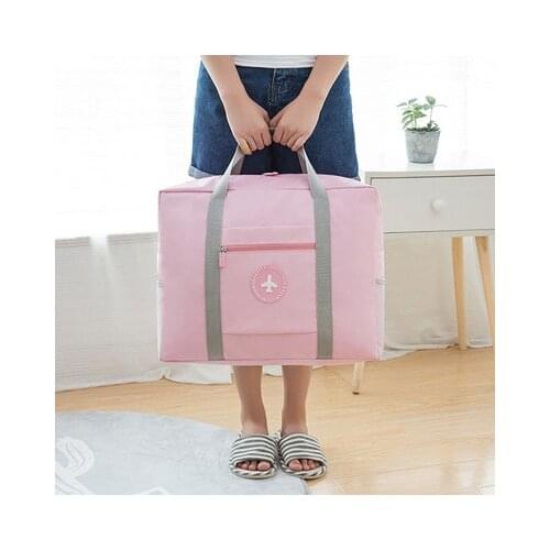 Japanese travel pure color small fresh round standard pull rod bag folding travel clothing storage bag quilt bag travel bag