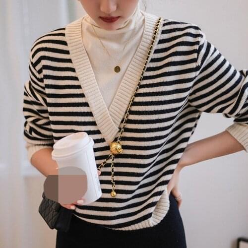 High-necked striped sweater women loose 2021 winter new fake two-piece design sense retro knitwear Korean version