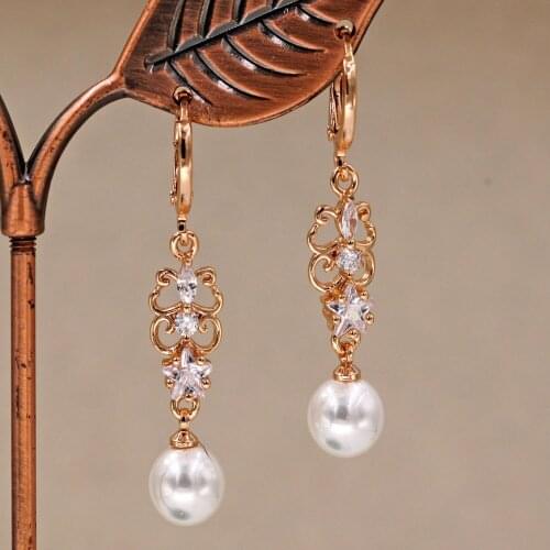 Woman dangle pearl earrings in Drop pearl Earrings Women 's earrings Trendy Fashion Gold Earrings white Zircon