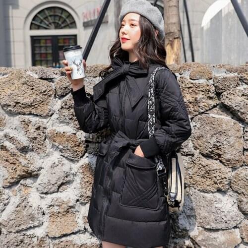 2019 winter Korean version down jacket fashion loose medium and long style thin women coat belt stand collar bow tie clothes