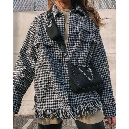 Europe and the United States womens fashion loose single-breasted jacket lapel plover case tassel burrs shirt