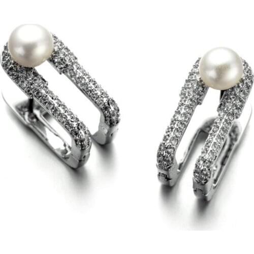 SALE 925 Sterling silver Needle Hollow Carved Earrings Female Crystal from Swarovskis Simple Temperament Wild Anti-allergic