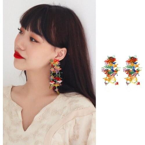 Make hand-woven meters long tassels color resin bead flower eardrop national wind earrings